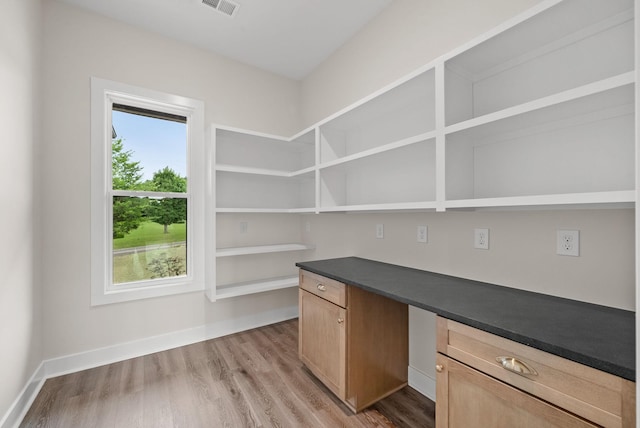 4015 Trough Springs Rd, Adams, TN 37010 - unfurnished office featuring light wood-style flooring and built in desk