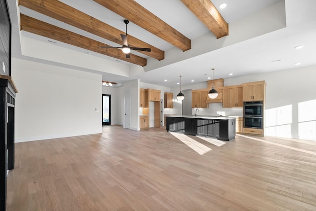 4015 Trough Springs Rd, Adams, TN 37010 - unfurnished living room with ceiling fan, beam ceiling, light wood-style flooring, and recessed lighting