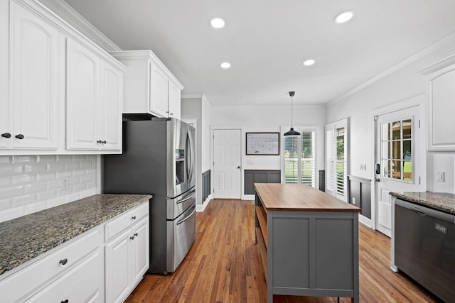 1204 Corlew Dr, Burns, TN 37029 - kitchen with wooden counters, stainless steel fridge with ice dispenser, white cabinets, crown molding, and recessed lighting