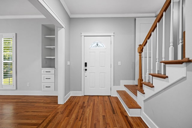 1204 Corlew Dr, Burns, TN 37029 - entrance foyer featuring stairway, wood finished floors, and crown molding