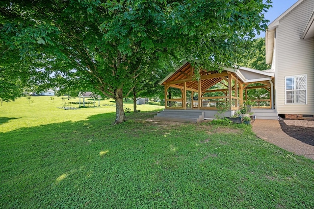 1204 Corlew Dr, Burns, TN 37029 - view of green lawn with a gazebo