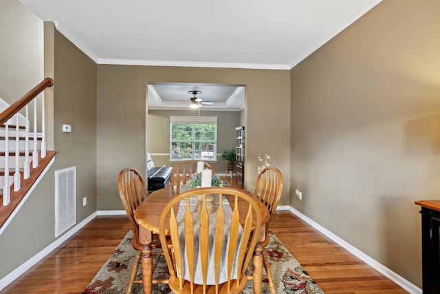 1511 Cardinal Ln, Mount Juliet, TN 37122 - dining space with wood finished floors, ornamental molding, stairway, and ceiling fan