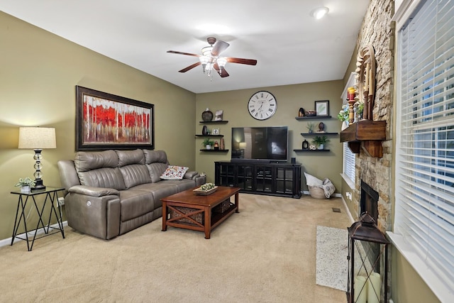 1511 Cardinal Ln, Mount Juliet, TN 37122 - living room featuring ceiling fan, carpet floors, and a stone fireplace
