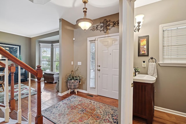 1511 Cardinal Ln, Mount Juliet, TN 37122 - entrance foyer featuring stairway, wood finished floors, and crown molding