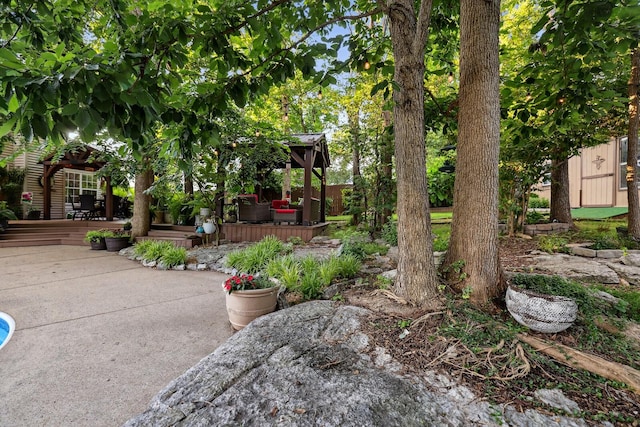 1511 Cardinal Ln, Mount Juliet, TN 37122 - view of yard featuring a wooden deck and a patio