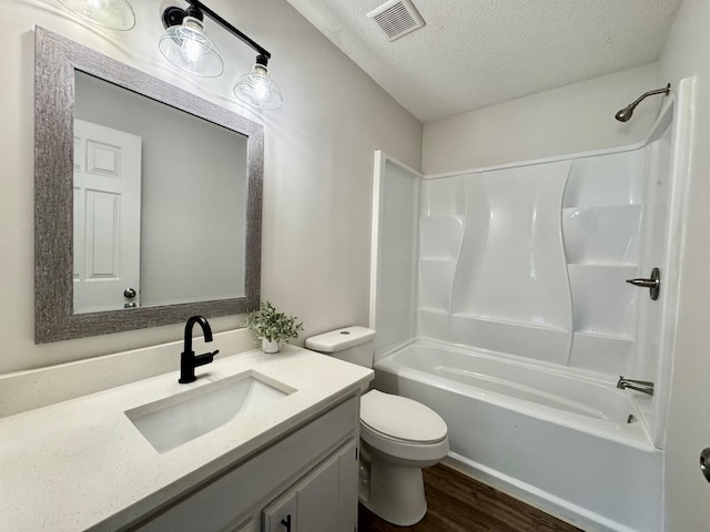 3409 Dutton Ct, Murfreesboro, TN 37130 - full bathroom featuring a textured ceiling, wood finished floors, vanity, and shower / bath combination