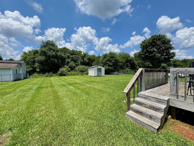 3409 Dutton Ct, Murfreesboro, TN 37130 - view of yard featuring a deck and a storage shed