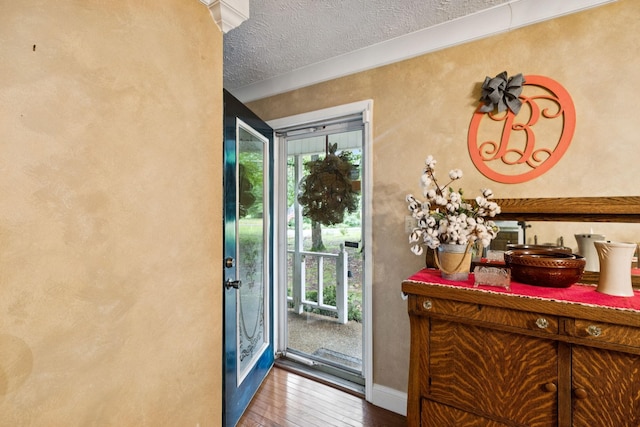 219 Lakeview Dr, Hohenwald, TN 38462 - doorway with plenty of natural light, hardwood / wood-style flooring, and a textured ceiling