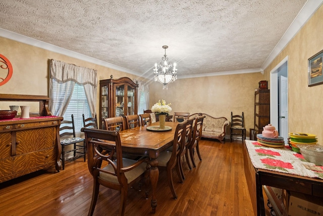 219 Lakeview Dr, Hohenwald, TN 38462 - dining area with hardwood / wood-style flooring, a chandelier, and a textured ceiling