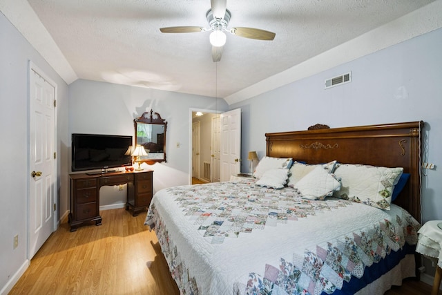 219 Lakeview Dr, Hohenwald, TN 38462 - bedroom with light wood-style floors, a textured ceiling, and ceiling fan