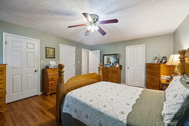 219 Lakeview Dr, Hohenwald, TN 38462 - bedroom featuring wood finished floors, a ceiling fan, and a textured ceiling