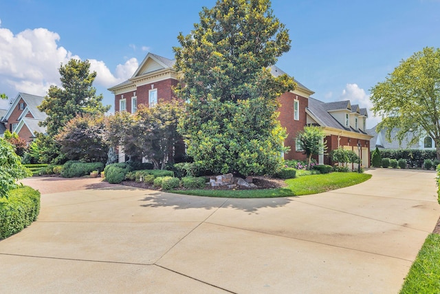 1512 Mirabella Way, Murfreesboro, TN 37130 - view of home's exterior featuring concrete driveway, brick siding, and a garage