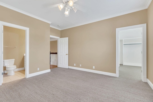 1512 Mirabella Way, Murfreesboro, TN 37130 - unfurnished bedroom with carpet flooring, a spacious closet, crown molding, ensuite bath, and a closet