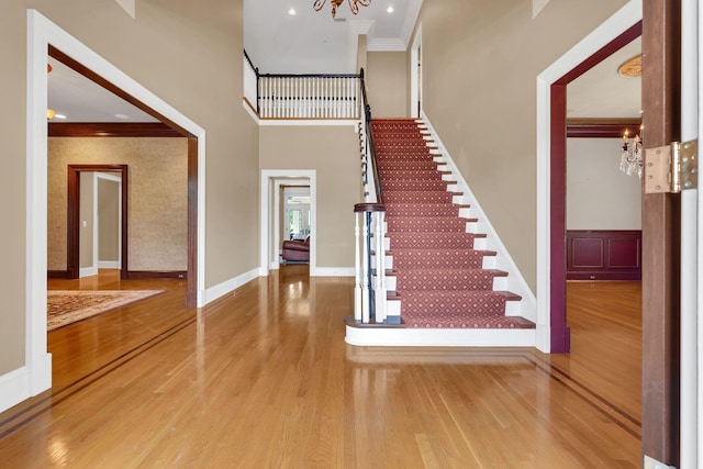 1512 Mirabella Way, Murfreesboro, TN 37130 - stairs featuring ornamental molding, a chandelier, and wood finished floors