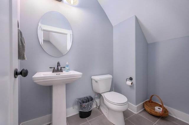 822 Manner Ln, Lebanon, TN 37087 - bathroom with lofted ceiling and tile patterned floors