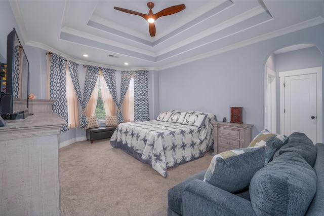 822 Manner Ln, Lebanon, TN 37087 - carpeted bedroom with a raised ceiling, arched walkways, crown molding, and a ceiling fan