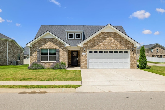 225 Thorpe Dr, Spring Hill, TN 37174 - view of front of house with an attached garage, a front lawn, concrete driveway, brick siding, and roof with shingles
