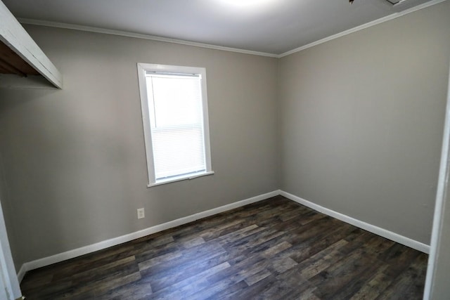 289 Long St W, Mc Ewen, TN 37101 - spare room with dark wood-style flooring and ornamental molding