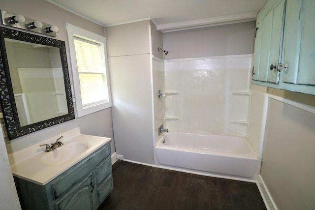289 Long St W, Mc Ewen, TN 37101 - bathroom with wood finished floors, vanity, shower / tub combination, and crown molding