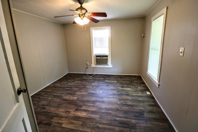 289 Long St W, Mc Ewen, TN 37101 - empty room featuring healthy amount of natural light, wood finished floors, ceiling fan, cooling unit, and ornamental molding