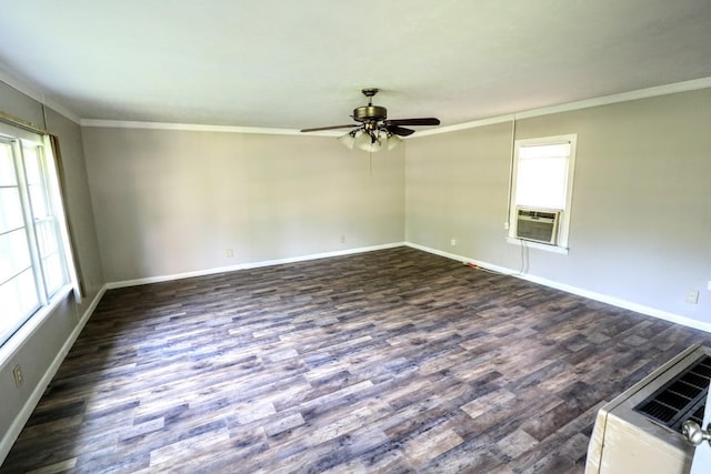 289 Long St W, Mc Ewen, TN 37101 - spare room featuring healthy amount of natural light, dark wood-type flooring, ceiling fan, crown molding, and cooling unit