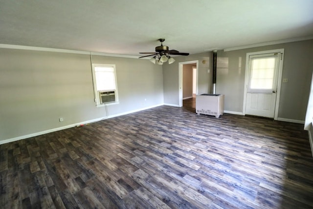 289 Long St W, Mc Ewen, TN 37101 - unfurnished living room featuring heating unit, ornamental molding, cooling unit, ceiling fan, and dark wood-style flooring