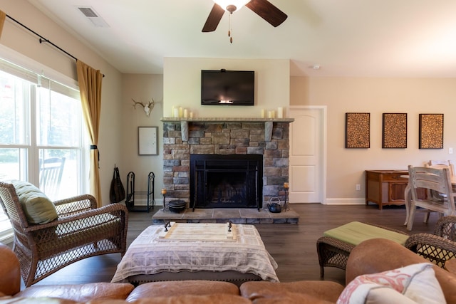 7929 Ridgewood Rd, Goodlettsville, TN 37072 - living room with ceiling fan, wood finished floors, and a stone fireplace