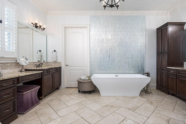 7216 Wildings Blvd, College Grove, TN 37046 - full bathroom featuring marble finish floors, a freestanding tub, ornamental molding, and vanity