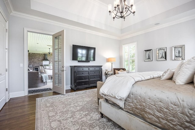 7216 Wildings Blvd, College Grove, TN 37046 - bedroom with wood finished floors, a chandelier, crown molding, and a raised ceiling