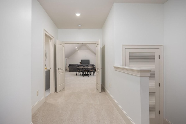 7216 Wildings Blvd, College Grove, TN 37046 - hall with light colored carpet, vaulted ceiling, a desk, and recessed lighting