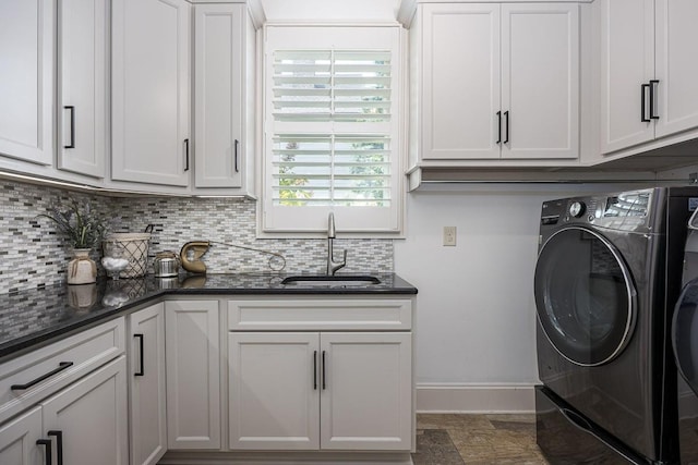 7216 Wildings Blvd, College Grove, TN 37046 - washroom with cabinet space and washing machine and clothes dryer