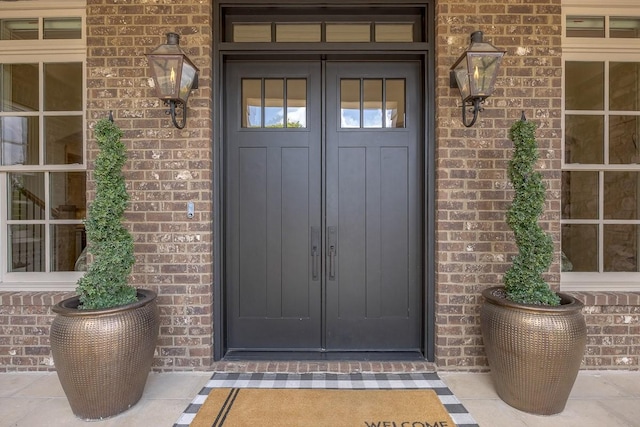 7216 Wildings Blvd, College Grove, TN 37046 - doorway to property featuring brick siding and french doors