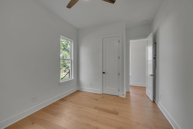 1117 38th Ave N Unit B, Nashville, TN 37209 - unfurnished bedroom with light wood-style floors and a ceiling fan