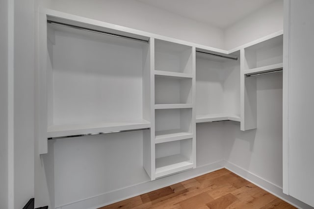 1117 38th Ave N Unit B, Nashville, TN 37209 - walk in closet featuring wood finished floors
