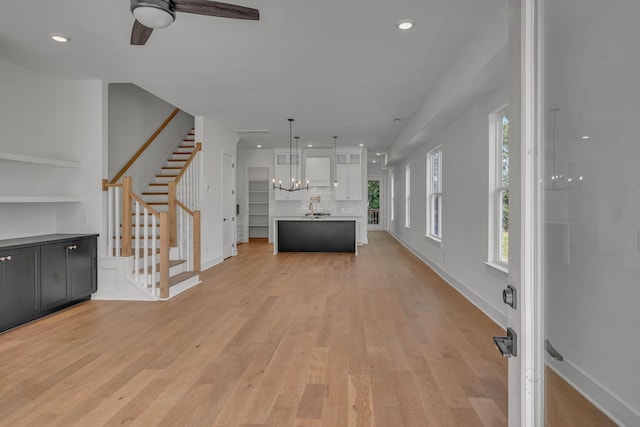 1117 38th Ave N Unit B, Nashville, TN 37209 - unfurnished living room featuring stairway, light wood finished floors, a ceiling fan, and recessed lighting