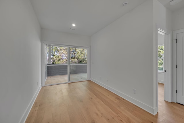 1117 38th Ave N Unit B, Nashville, TN 37209 - unfurnished room featuring plenty of natural light, light wood-type flooring, a smoke detector, and recessed lighting