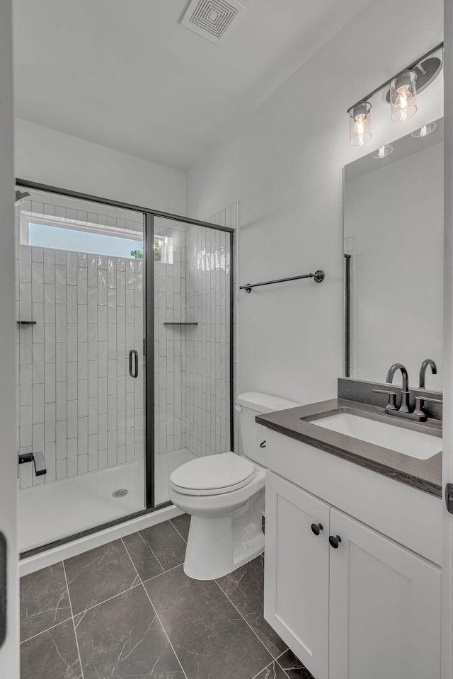 1117 38th Ave N Unit B, Nashville, TN 37209 - full bath featuring marble look tiles, vanity, and a shower stall