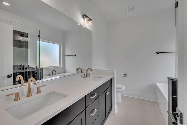 1117 38th Ave N Unit B, Nashville, TN 37209 - full bathroom with a freestanding bath, double vanity, and a tile shower