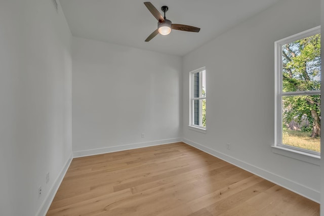 1117 38th Ave N Unit B, Nashville, TN 37209 - unfurnished room featuring healthy amount of natural light, light wood-style flooring, and ceiling fan