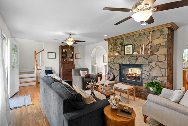 3406 Parks Ln, Spring Hill, TN 37174 - living room with ceiling fan, arched walkways, stairway, wood finished floors, and a fireplace