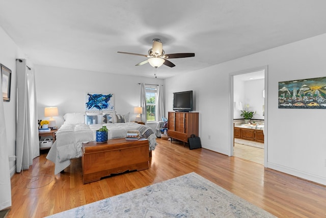 3406 Parks Ln, Spring Hill, TN 37174 - bedroom featuring light wood-type flooring, connected bathroom, and a ceiling fan