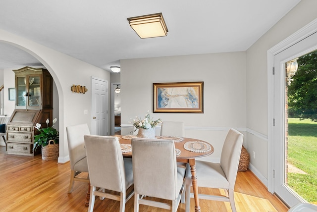 3406 Parks Ln, Spring Hill, TN 37174 - dining room with healthy amount of natural light, arched walkways, and light wood-type flooring
