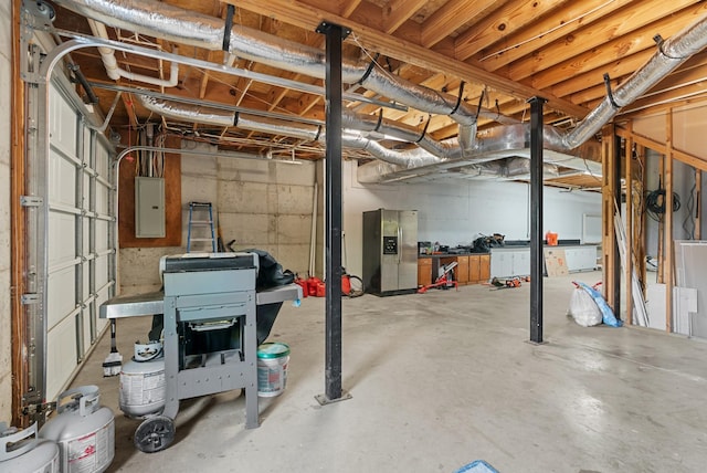 3406 Parks Ln, Spring Hill, TN 37174 - unfinished basement featuring electric panel and stainless steel fridge