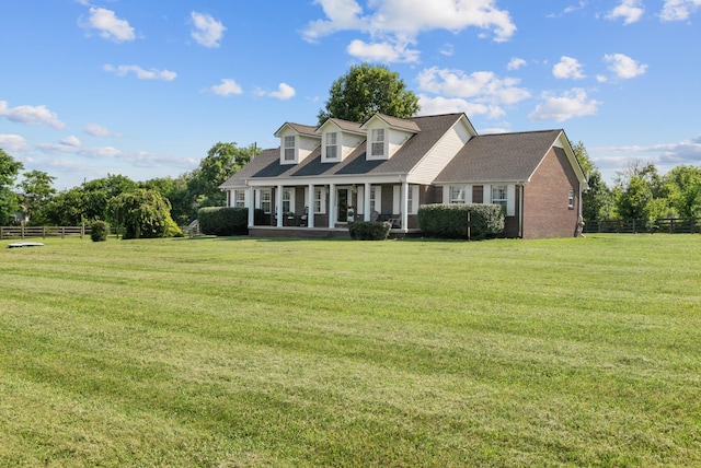 3406 Parks Ln, Spring Hill, TN 37174 - new england style home with a porch and brick siding