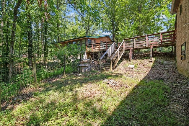 15578 Birdsong Rd, Holladay, TN 38341 - view of yard with stairway and a deck