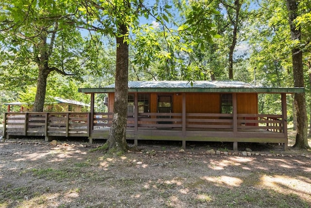 15578 Birdsong Rd, Holladay, TN 38341 - back of house featuring a metal roof