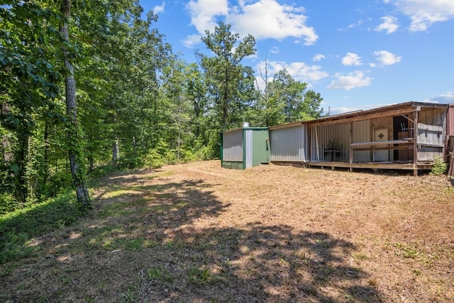 15578 Birdsong Rd, Holladay, TN 38341 - view of yard featuring an outdoor structure