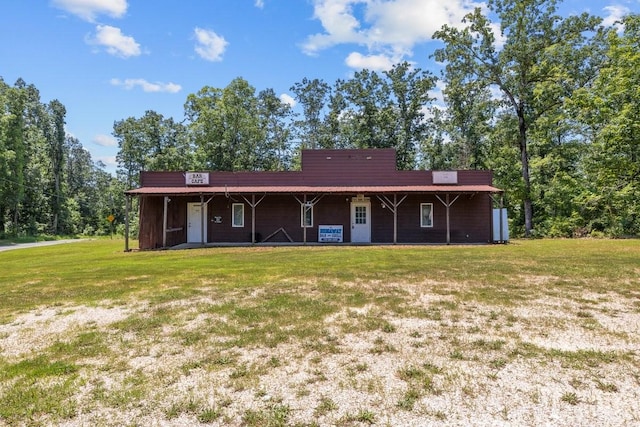 15578 Birdsong Rd, Holladay, TN 38341 - view of front of home featuring a front lawn and a porch