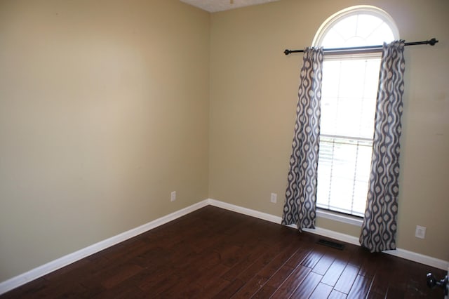 1102 Fairways, Lebanon, TN 37087 - empty room featuring dark wood-style floors and baseboards