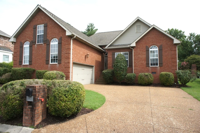 1102 Fairways, Lebanon, TN 37087 - view of front facade with brick siding, driveway, and a shingled roof